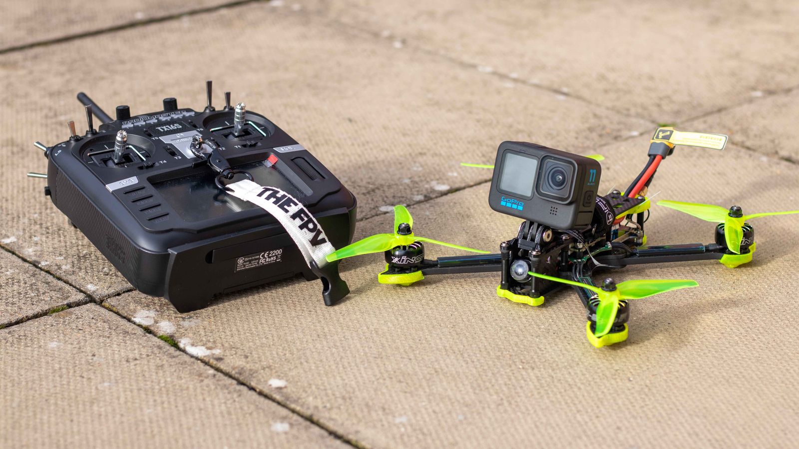 Reference photograph of an FPV drone and radio controller